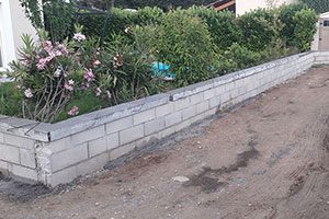 Construction d'un Muret et pose d'une clôture en PVC